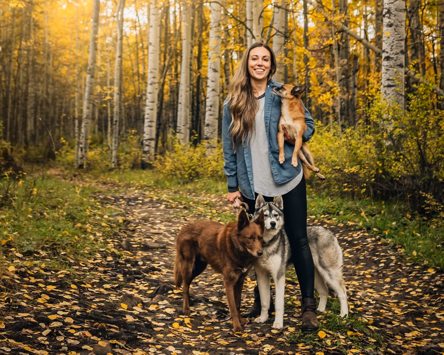 Natasha Johnson with three dogs