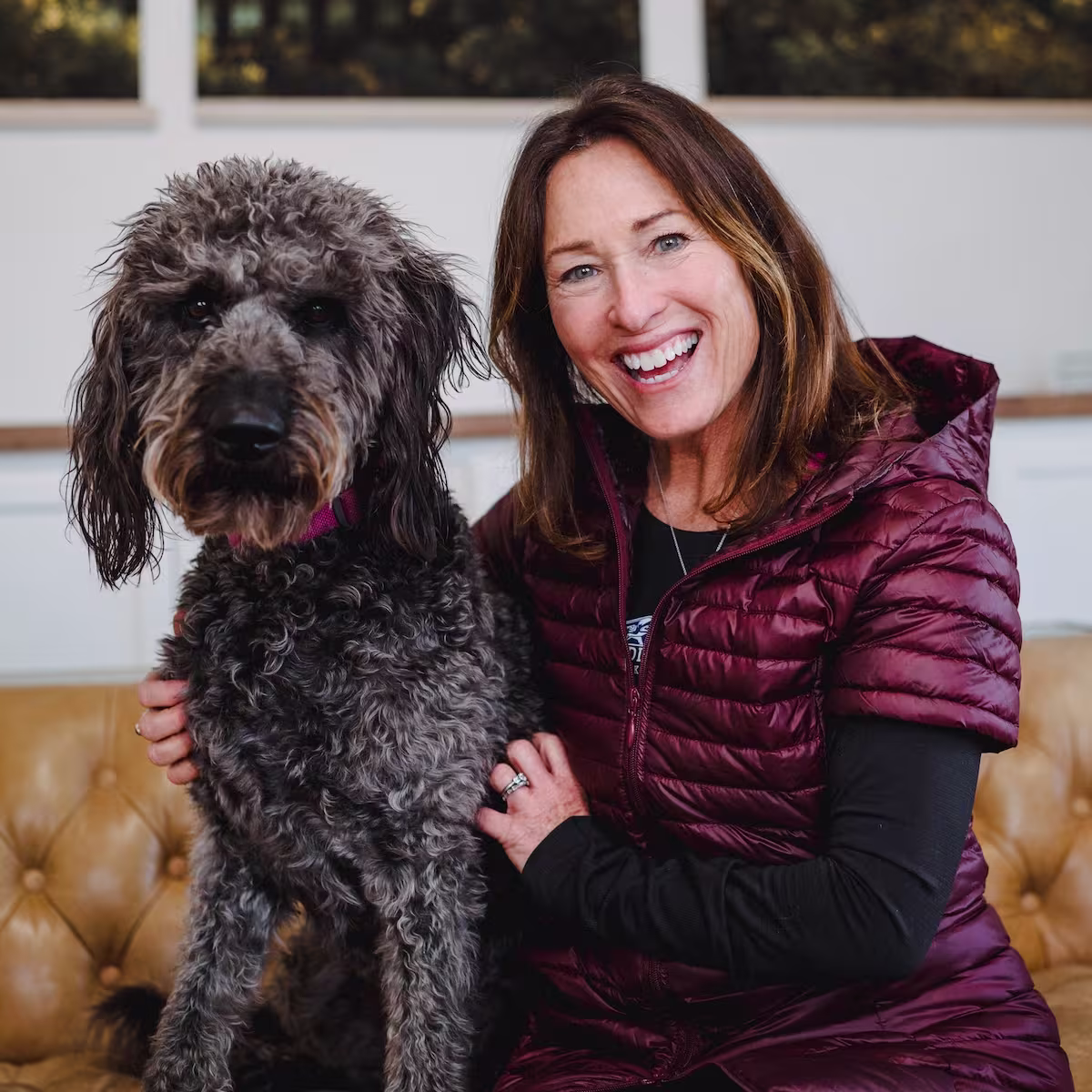 Natasha with a grey poodle